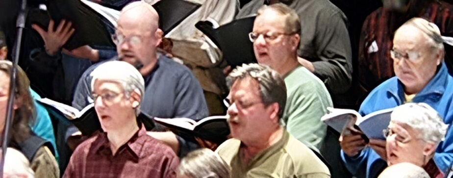 creating something beautiful with others: photograph of Brattleboro Concert Choir members singing
