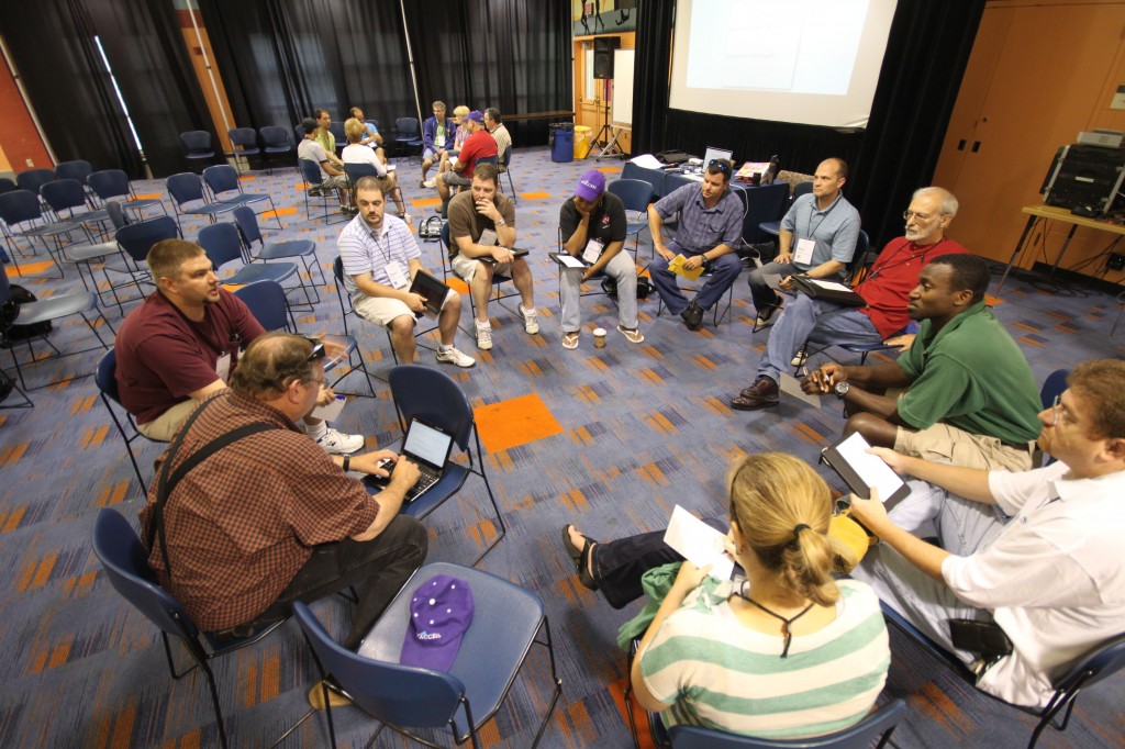 Photograph of small groups meeting at the edACCESS 2011 peer conference