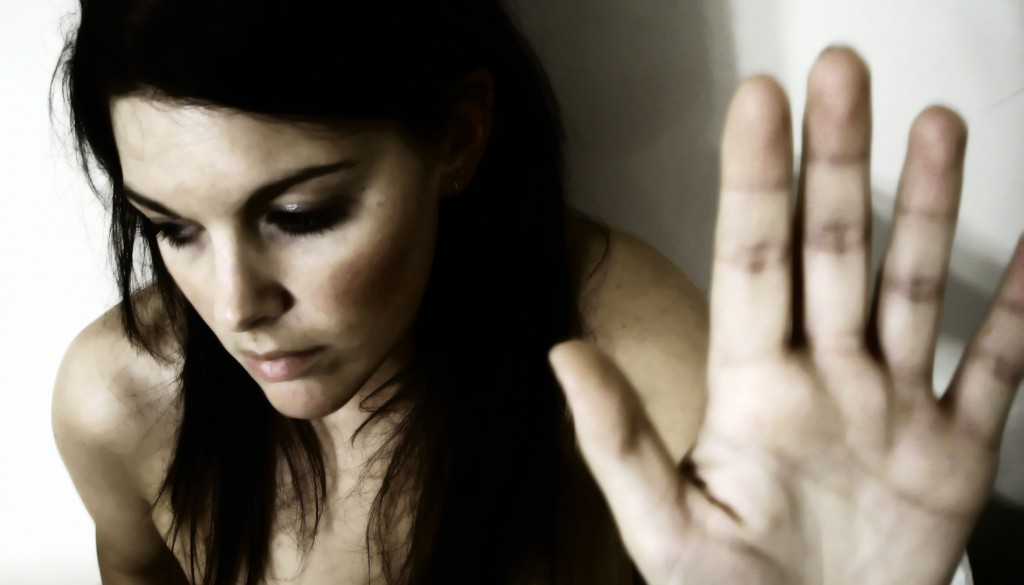 you can't please everyone: photograph of a woman looking away with her hand held up. Photo attribution: Flickr user meredithfarmer
