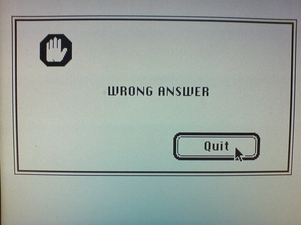 A computer dialog box that has the text "WRONG ANSWER" and a single "Quit" button to click.