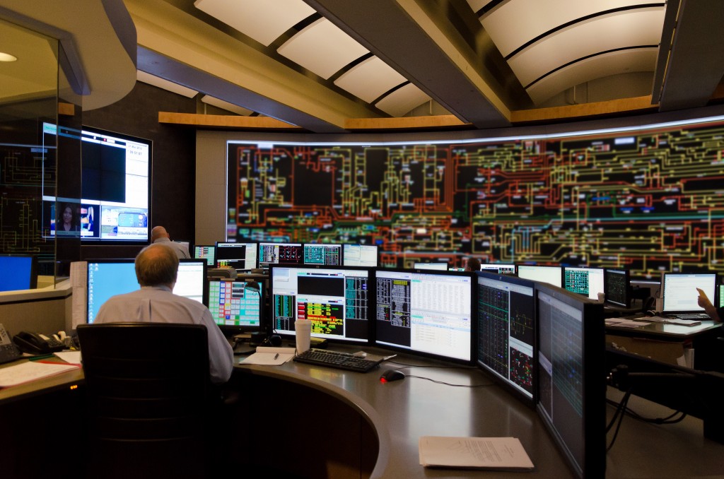 conference participants control: photograph of a complex control center in an industrial plant
