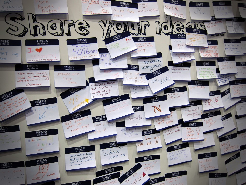 containers for ideas: photograph of a whiteboard labeled "Share your ideas" and covered with numerous sticky notes, each containing handwritten ideas. Photo attribution: Flickr user nanpalmero