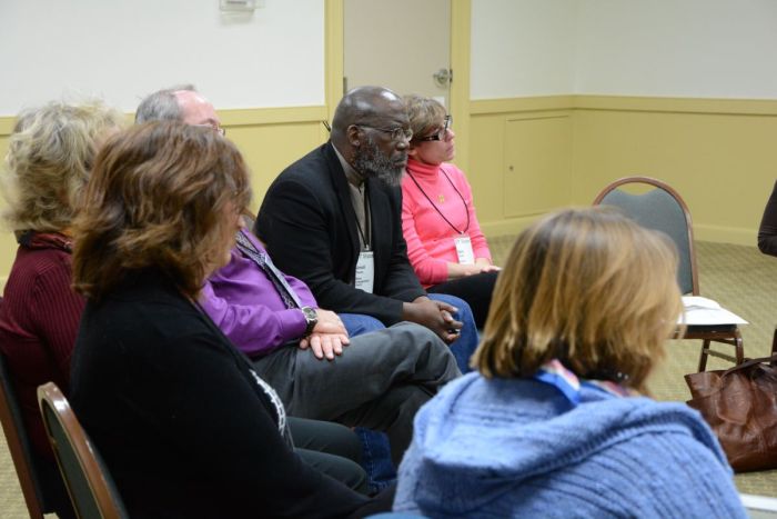 photograph of attendees at a peer conference: The Third Annual Vermont Vision For A Multicultural Future peer conference, November 6-7, 2014