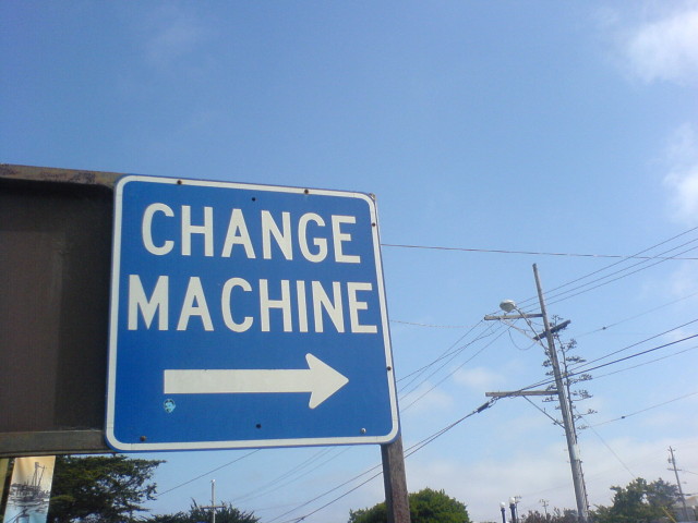 personal change is easy: a photograph of an outdoor sign that says "CHANGE MACHINE" with a directional arrow