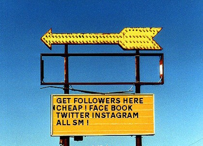 trashing brand social media: a battered roadsign with a billboard that says "GET FOLLOWERS HERE CHEAP! FACE BOOK TWITTER INSTAGRAM ALL SM!"