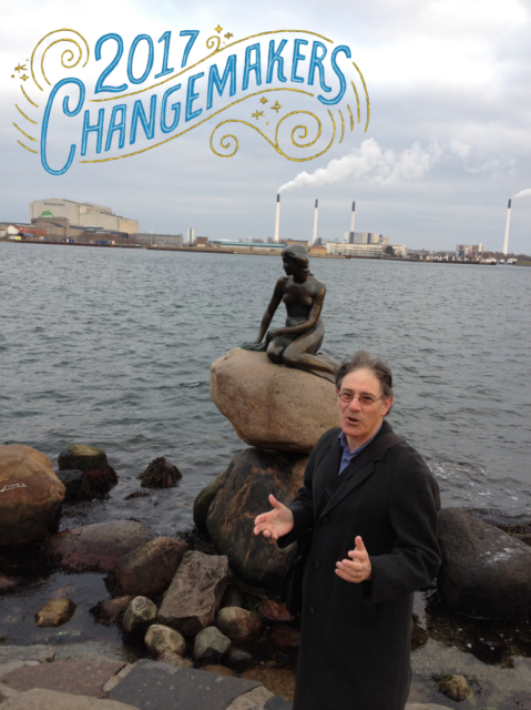 MeetingsNet’s annual Changemaker list: photograph of Adrian Segar in front of the Little Mermaid statue in Copenhagen, Denmark