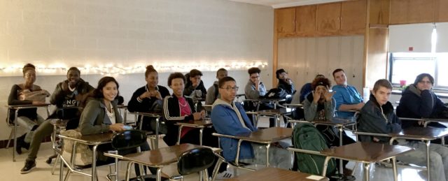 The hype and reality of personalized learning: a photograph of children sitting at desks in a classroom. Image attribution: edusurge