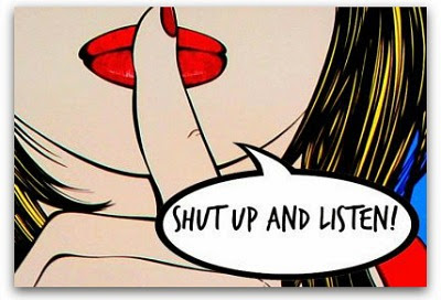 An illustration of a close-up of a woman's mouth with a finger held to her lips. She is saying "Shut up and listen!"