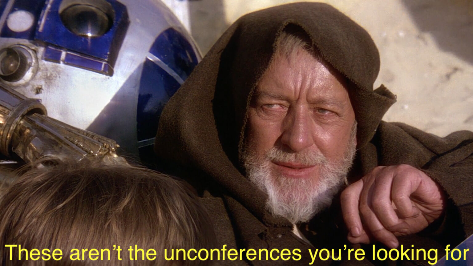 Obi-Wan Kenobi in the famous Star Wars scene where he's stopped by Imperial stormtroopers on entering Mos Eisley and muddles their minds. The caption reads: "These aren't the unconferences you're looking for."