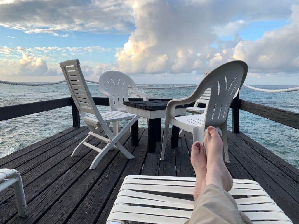 Lessons from Anguilla: Photograph of our deck overlooking the North Atlantic, including the author's feet