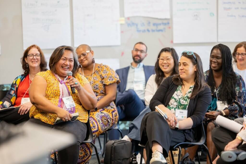 client feedback: Photograph of participants at a Peace and Security Funders Group meeting from the organization's website
